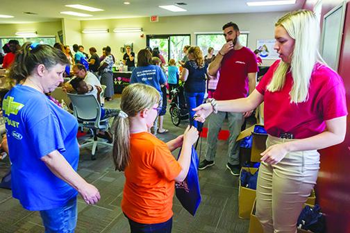 The LifeSouth Community Blood Centers backpack giveaway in 2019 was a festive event with officials handing out school supplies to local students. This year’s event, however, will be drive-thru only.