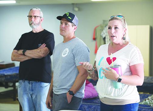 Jeremy Rea, center, and Melissa Rea, right, said Recovery Point would help people battling addiction transition to a stable life. The Reas said establishing Recovery Point was a two-year process..