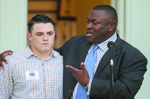 Palatka Mayor Terrill Hill introduces Sons of Confederate Veterans member Gavin Thomas to people attending a Race Issue Study Circles meeting in 2017 at the Bronson-Mulholland House.