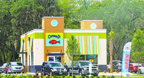 Cars circle the newly-opened Captain D’s in Palatka on Monday with some cars spilling onto State Road 19.