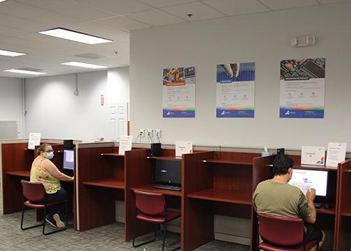 Local residents fill out job applications at CareerSource in Palatka.