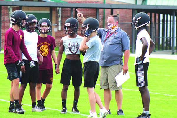 New Crescent City head football coach Sean Delaney provides direction Monday afternoon. (MARK BLUMENTHAL / Palatka Daily News)