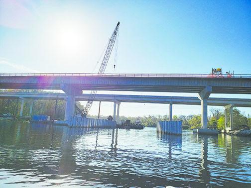 Construction takes place on the Dunns Creek bridge as part of a state project to widen U.S. 17 from two lanes to four lanes.