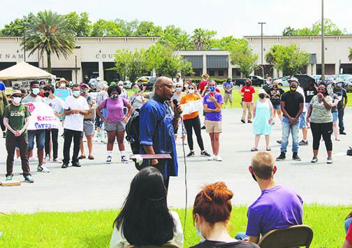 A St. Augustine pastor, Rev. Ron Rawls, advocates for change and not staying silent during Saturday's peaceful protest. 