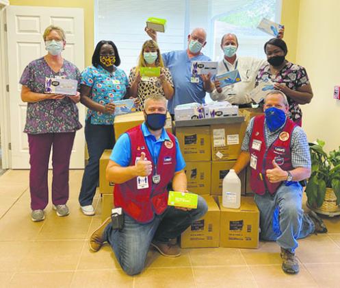 Lowe’s Home Improvement employees donate personal protective equipment to Haven Hospice Roberts Care Center in Palatka on Wednesday to combat coronavirus.