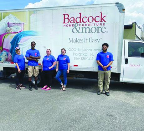 Badcock Home Furniture & More employees delivered refrigerators purchased by Feed the Need to county schools at no cost.