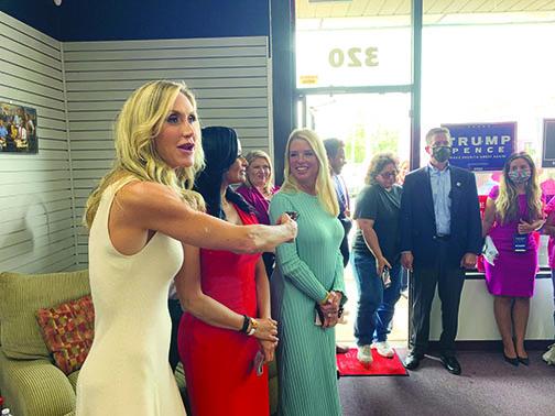 From left, Lara Trump, Katrina Pierson and Pam Bondi greet a crowd of about 75 people at the Putnam County Republican Party headquarters Wednesday afternoon for the Woman for Trump Bus Tour.
