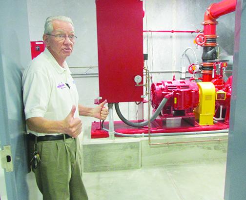 Comarco President Tom Hoversen talks about some of the new equipment at the company’s facility in the Putnam County Business Park in May. The company is still in the process of moving its headquarters from New Jersey to Palatka, where officials expect the plant will create about 120 jobs locally.