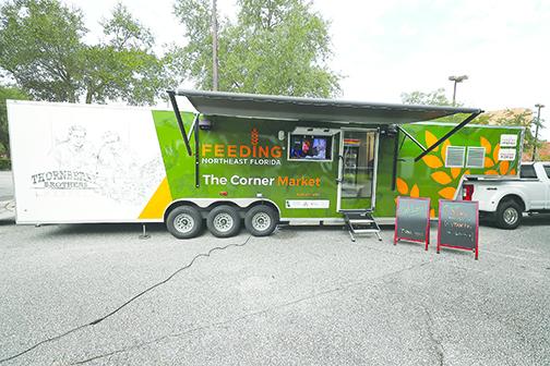 Feeding Northeast Florida, which donates food to Epic-Cure of Palatka, set up a Corner Market in Jacksonville, where free food is given to people in need.