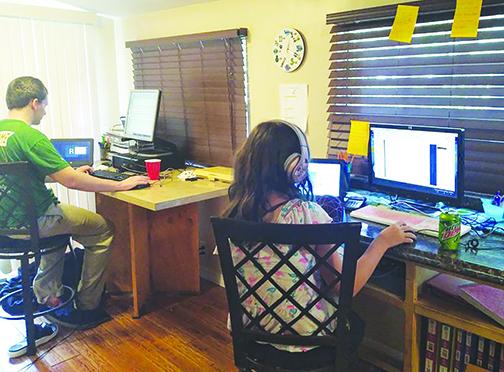 Putnam County School District students attend class last month via distance learning.