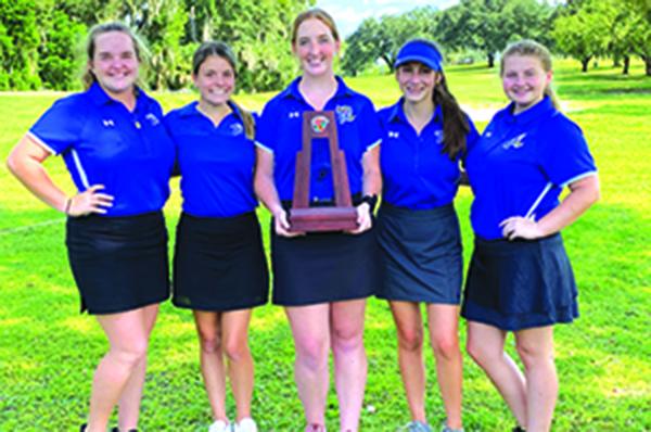 Palatka High girls golf players, from left, Samantha Clark, Lauren Matthews, Julie Wilhite, Jewell Wilhite and Lindsey Jones smile with the District 3-2A runnersup trophy on Tuesday. (Submitted photo)