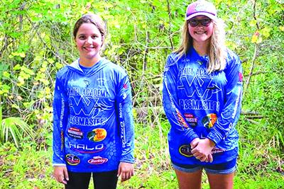 Cora Landis, left, and Kelly Byrd pose together after winning their divisions in the Peniel Academy Bassmasters–Anglers For Christ bass tournament last Saturday. (Submitted photo)