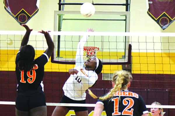 Crescent City’s Aniya Hardy (10) goes up for a kill attempt against Trenton’s Samarie McHenry (19) and Bri Becker during Tuesday’s regional semifinal match. (MARK BLUMENTHAL / Palatka Daily News)