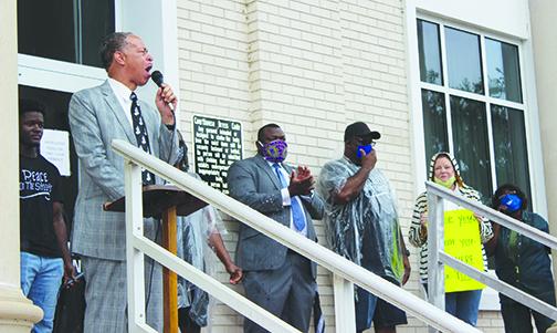 The Rev. Karl Flagg, a former county commissioner, speaks during the PEACE in the STREETS rally in June, where protesters gathered at the Putnam County Courthouse to call for the relocation of the Confederate monument that sits at the property.