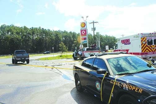 Authorities respond to a pedestrian’s death Friday morning at Circle K, where they said a truck hit a woman near the gas pumps.