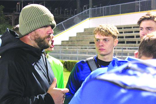 Palatka High School boys soccer coach Jeff Malandrucco, here talking to his players after a win last year against Jacksonville Ed White High School, begins his fifth season in charge of the program. (MARK BLUMENTHAL / Palatka Daily News)