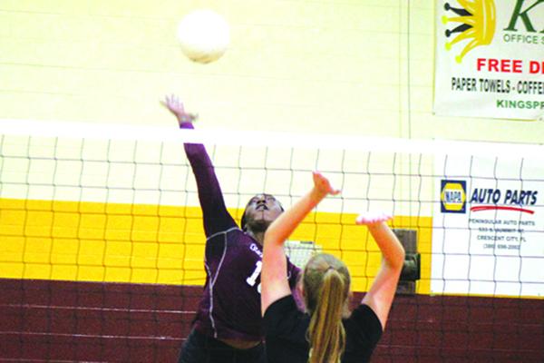 Aniya Hardy goes high over Fort Meade’s Libby Newman in Crescent City High School’s District 8-1A championship victory at home on Oct. 15. (MARK BLUMENTHAL / Palatka Daily News)