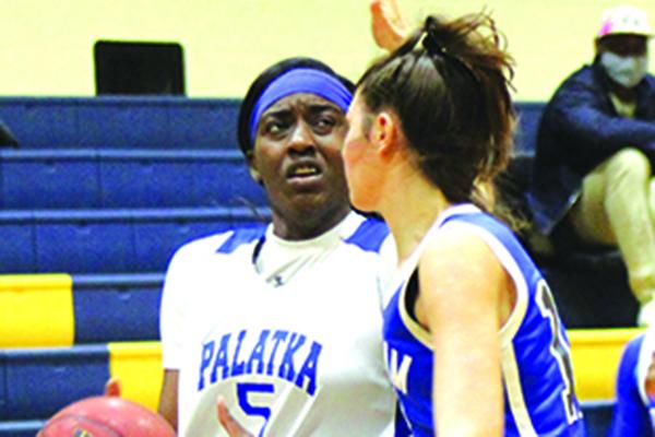 Palatka’s Amareya Turner looks for room to move against Bartram Trail’s Hannah Klein during Tuesday’s game at Palatka High. (MARK BLUMENTHAL / Palatka Daily News