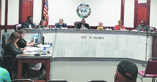 Palatka Mayor Terrill Hill, center, sits between former City Manager Bill Shanahan, right, whom the Palatka City Commission voted, 3-2, to fire in the spring, and current City Manager Don Holmes, left, who was appointed to the position in April.