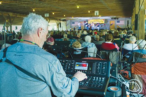A sound engineer makes sure the show is music to everyone’s ears during the 2019 Spring Palatka Bluegrass Festival at Rodeheaver Boys Ranch.