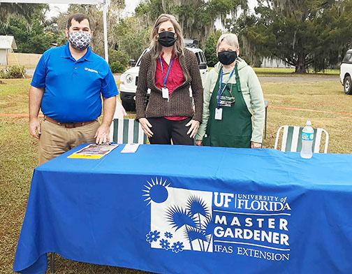 University of Florida Master Gardeners are stationed at their booth Saturday for Arbor Day in Crescent City.