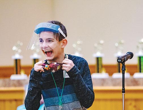 Armand Küykendall, a Miller Middle School seventh-grader, smiles Friday as he realizes he won the 52nd Putnam County School District Spelling Bee for the third year in a row.