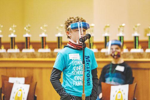 Runner-up Connor Huntley, a Melrose Elementary School fifth-grader, competes in the final rounds of the spelling bee.