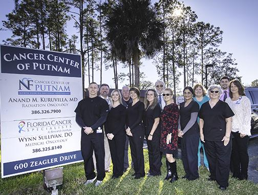 Cancer Center of Putnam employees stands in front of the Palatka office about two years ago.