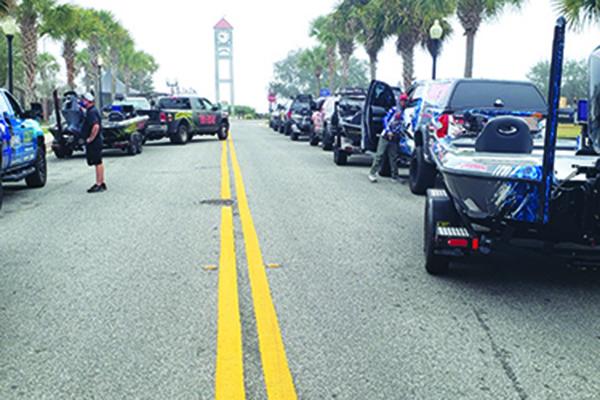 Boats line up on St. Johns Avenue near the Palatka dock as registration takes place Wednesday for the upcoming four-day tournament. (WAYNE SMITH / Palatka Daily News)