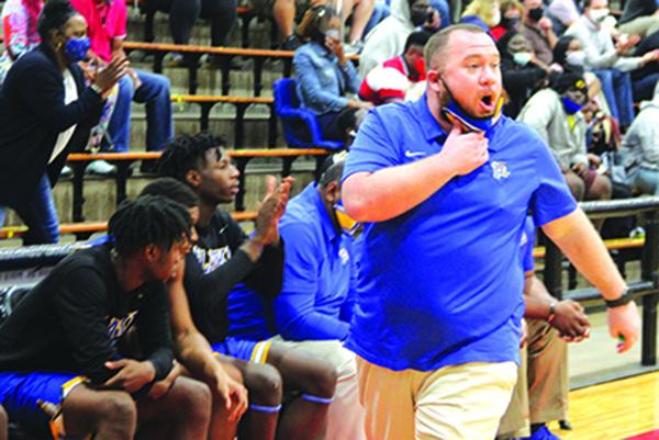 Palatka High boys basketball coach Bryan Walter shouts instructions at his players during Wednesday night’s District 4-4A semifinal. (ANTHONY RICHARDS / Palatka Daily News)