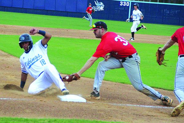Northwest Florida State third baseman Trace Wilhoite is late with the tag of St. Johns River State’s Ramses Cordova during Thursday’s game at Tindall Field. (ANTHONY RICHARDS / Palatka Daily News)