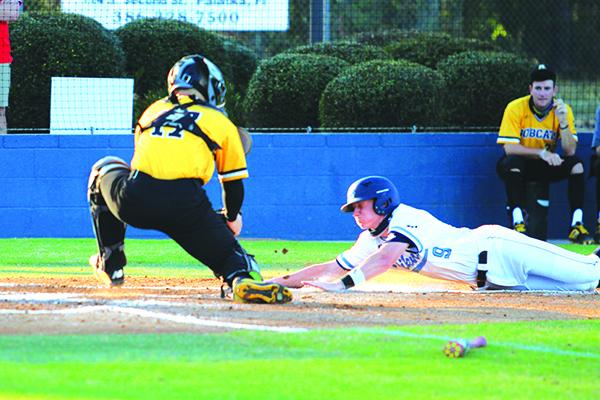 St. Johns River State College’s J.J. Sousa is tagged out by Pasco-Hernando catcher Diego Garcia in the first inning Thursday night. (MARK BLUMENTHAL / Palatka Daily News)
