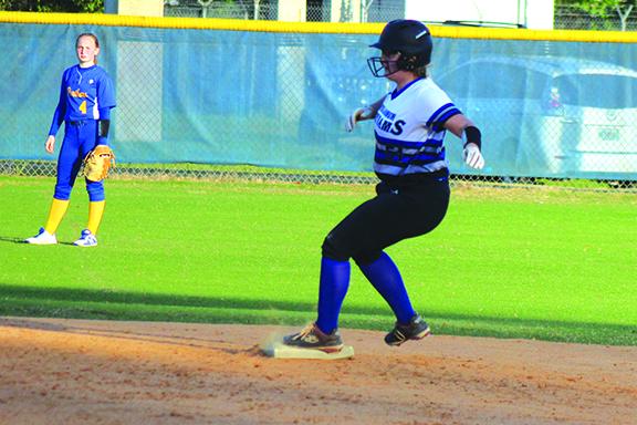 Interlachen’s Sierra Boynton rolls into second base after hitting a double to break up Amy Kennedy’s no-hit bid in last year’s county tournament championship game against Palatka. (MARK BLUMENTHAL / Palatka Daily News)
