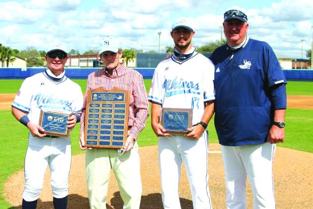 Recipients Chase Malloy (left) and Heston Mosley (second, right) pose with their John C. Tindall Endowed scholarship awards with former St. Johns River baseball coach John Tindall (second, left) and current baseball coach Ross Jones. (Submitted / St. Johns River State College)