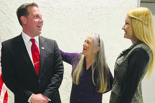 Newly elected Welaka Town Council members gather following their swearing-in ceremonies Friday at the town’s open-air pavilion adjacent to Town Hall. From left, Mayor Jamie Watts, Council Member Marianne Milledge and Council Member Tonya Long.