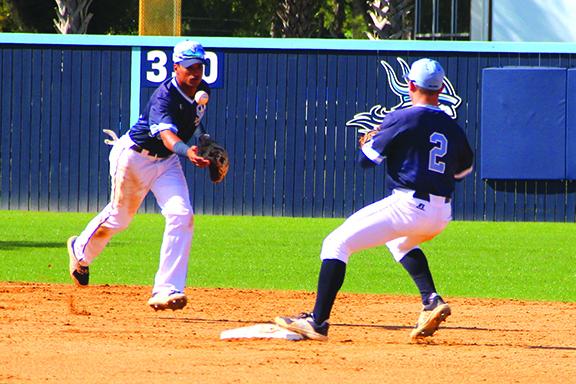 St. Johns River State College shortstop Ramses Cordova flips the ball to second baseman Chase Malloy to finish out a third-inning forceout. (ANTHONY RICHARDS / Palatka Daily News)