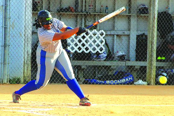 Interlachen’s Janae Green hits a groundball during the second inning of Tuesday’s game against Peniel Baptist Academy at Rotary Park. Green would reach on an error on the hit. (ANTHONY RICHARDS / Palatka Daily News)