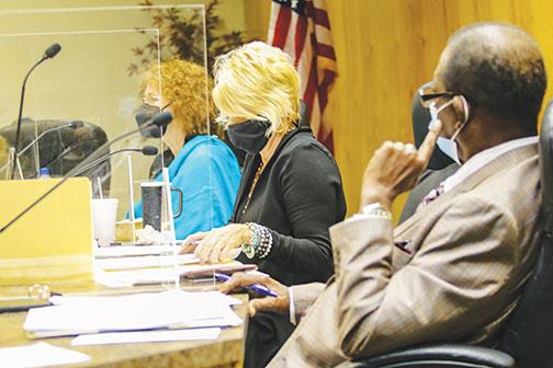 From left, Crescent Commissioner Judith West, Mayor Michele Myers and Commissioner Harry Banks listen to public comment during a commission meeting Thursday. 