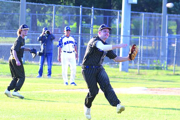 Palatka’s third baseman Jamie Crouse makes the throw on the run to get Interlachen’s Reggie Allen Jr. at first base during the second inning of Thursday night’s game. (ANTHONY RICHARDS / Palatka Daily News)