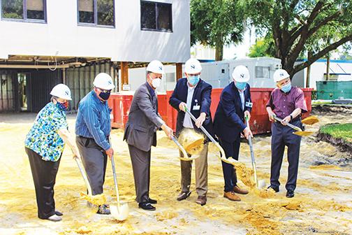 Putnam Community Medical Center board members break ground Thursday on the site of the hospital’s new MRI unit that officials expect to be completed by the end of the year.