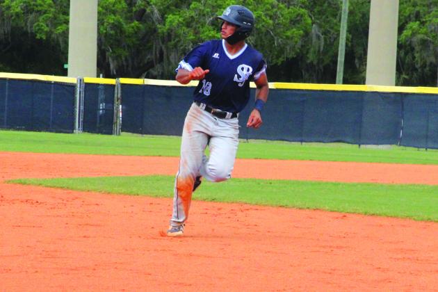 St. Johns River State College’s Ramses Cordova advances to third base after a single by Connor Morgan in the second inning. (ANTHONY RICHARDS / Palatka Daily News)