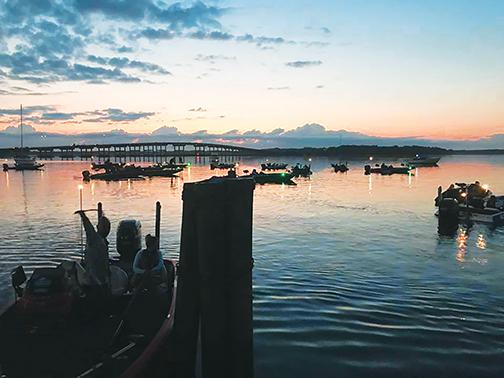 Boaters get ready to take off at safe light with Memorial Bridge in the background during a previous Wolfson Children’s Hospital Bass Tournament. The tournament returns to the Palatka riverfront Saturday with two lead-up events occurring Thursday and Friday.