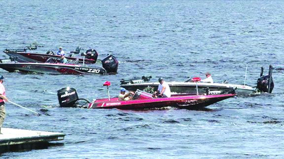 Boats come in and out as tournament participants weigh in their fishon Friday. (ANTHONY RICHARDS / Palatka Daily News)
