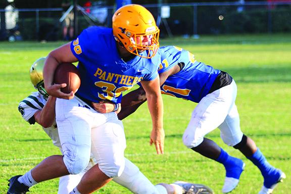  Palatka’s Jack Tilton looks for room to run in the first half. Nease defeated Palatka, 41-21. (MARK BLUMENTHAL / Palatka Daily News)