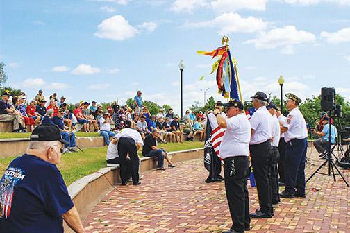Members of American Legion Bert Hodge Post 45 present the colors during a Memorial Day ceremony Monday morning at the Palatka riverfront. 