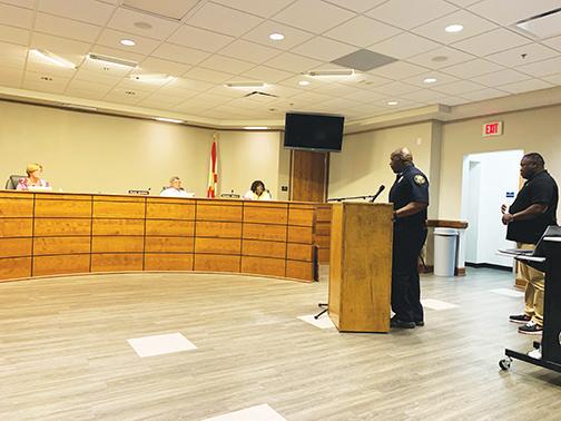 Palatka Police Department Chief Jason Shaw, accompanied by Mayor Terrill Hill, speaks to members of the Putnam County School District board about the importance of not letting Jenkins Middle School become a vacant facility.