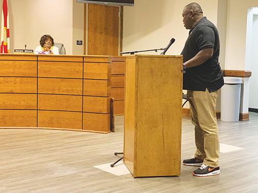 Palatka Mayor Terrill Hill addresses Putnam County School District board members about what will happen to the Jenkins Middle School building after it closes.