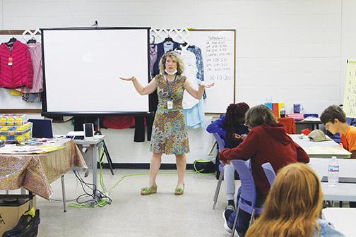 During a Jobs for Florida Graduates camp Friday, Becci Motes gives middle school students professionalism tips to use when looking for a job.