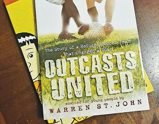 “Outcasts United” is among the numerous books that have come under scrutiny after Q.I. Roberts Junior-Senior High School released its summer reading list. 