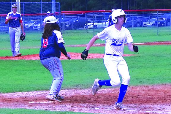 Melrose’s Andrew Wilson beats the throw at first on a double-play attempt as Fort White first baseman Kamdyn Stoddard takes the throw. (ANTHONY RICHARDS / Palatka Daily News)